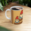 Mug with cartoon gnomes design on a wooden surface