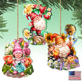 Three hanging gnome ornaments with flowers, strawberries, a watering can, honey and bees.