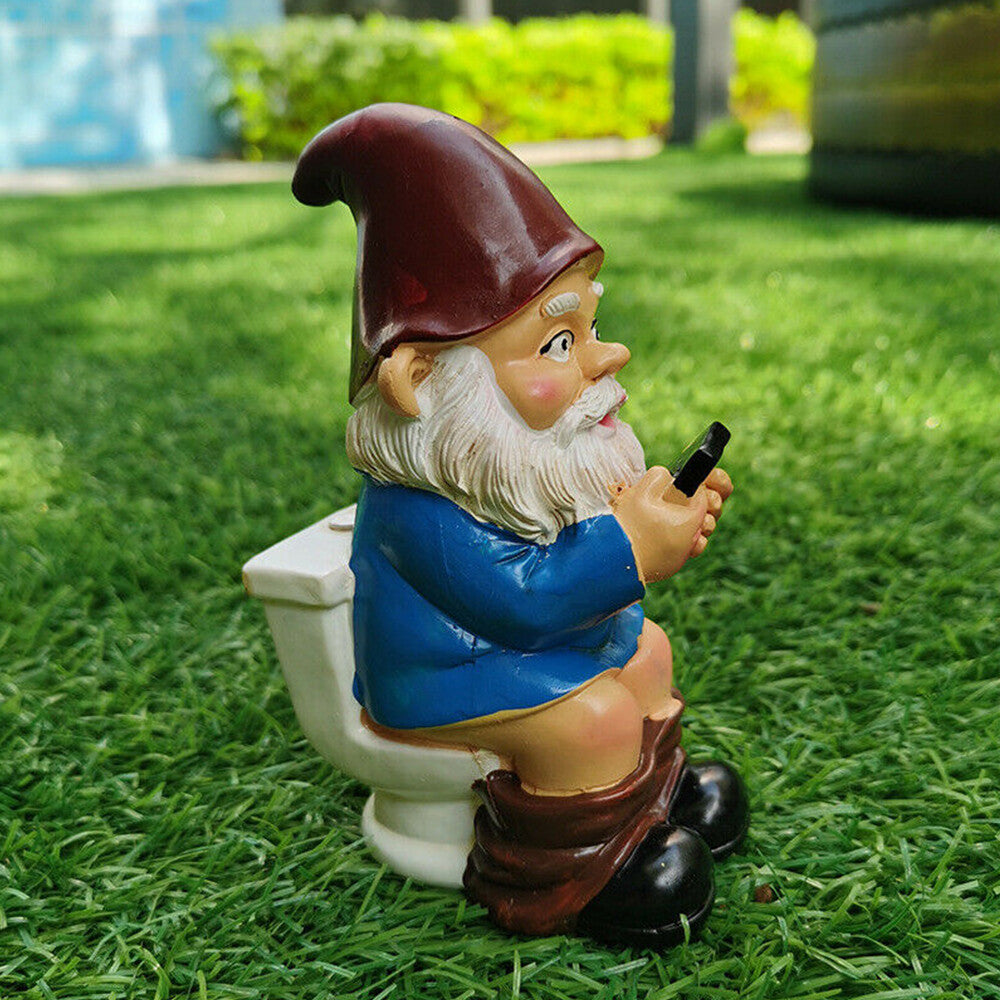 Grums the Gnome on the Toilet Playing on Phone 