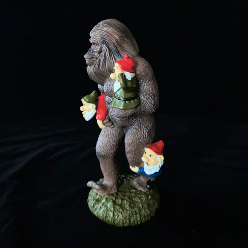 Chimpanzee and Dwarf Statues