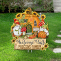 Personalized Welcome Fall garden stake with a pumpkin house, two gnomes, sunflowers and sample Higgins Family wording.