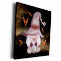 Dark canvas wall art depicting a mauve witch-hatted gnome holding a potion bottle among floating orange candies.