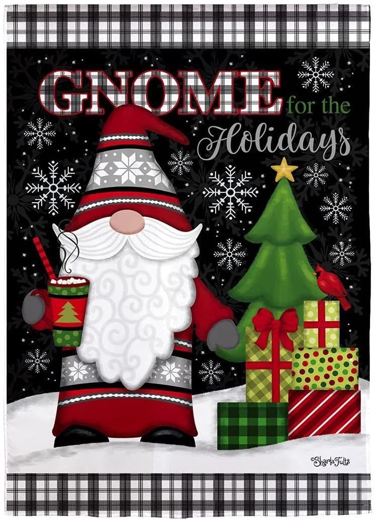 Christmas garden flag with a red-clad gnome holding a mug beside gifts and a tree under Gnome for the Holidays wording.