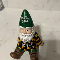 Garden Gnome figurine that is customizable wearing a striped shirt and hat on a white background