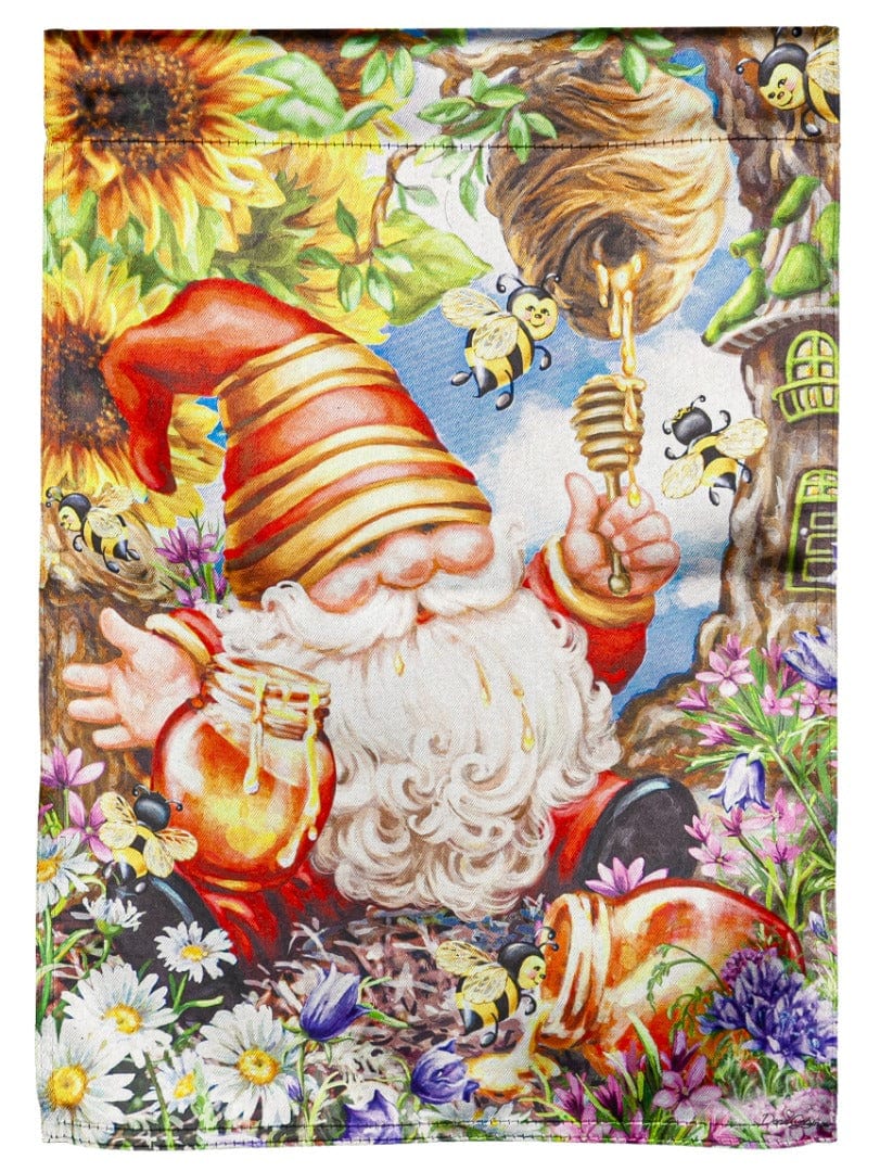 Garden flag with a striped-hat gnome, honey jar and dipper, surrounded by bees, flowers and a hanging beehive.