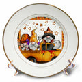 Gold-rimmed decorative plate showing Halloween gnomes and a ghost riding in an orange pickup truck under stars.