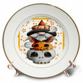 Gold-rimmed decorative plate showing a gnome stacked above a jack-o'-lantern and gray skull among ghosts and stars.