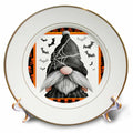 Gold-rimmed decorative plate with a black spiderweb-hatted gnome surrounded by bats and an orange skull border.