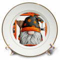 Gold-rimmed decorative plate showing a gnome with a black-and-orange spotted hat, broom and dangling spider.