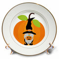 Gold-rimmed decorative plate with a black witch-hatted gnome holding a jack-o'-lantern against a large pumpkin.