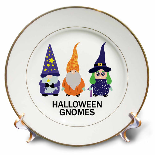 White decorative plate with three purple-and-orange wizard and witch gnomes above Halloween Gnomes lettering.