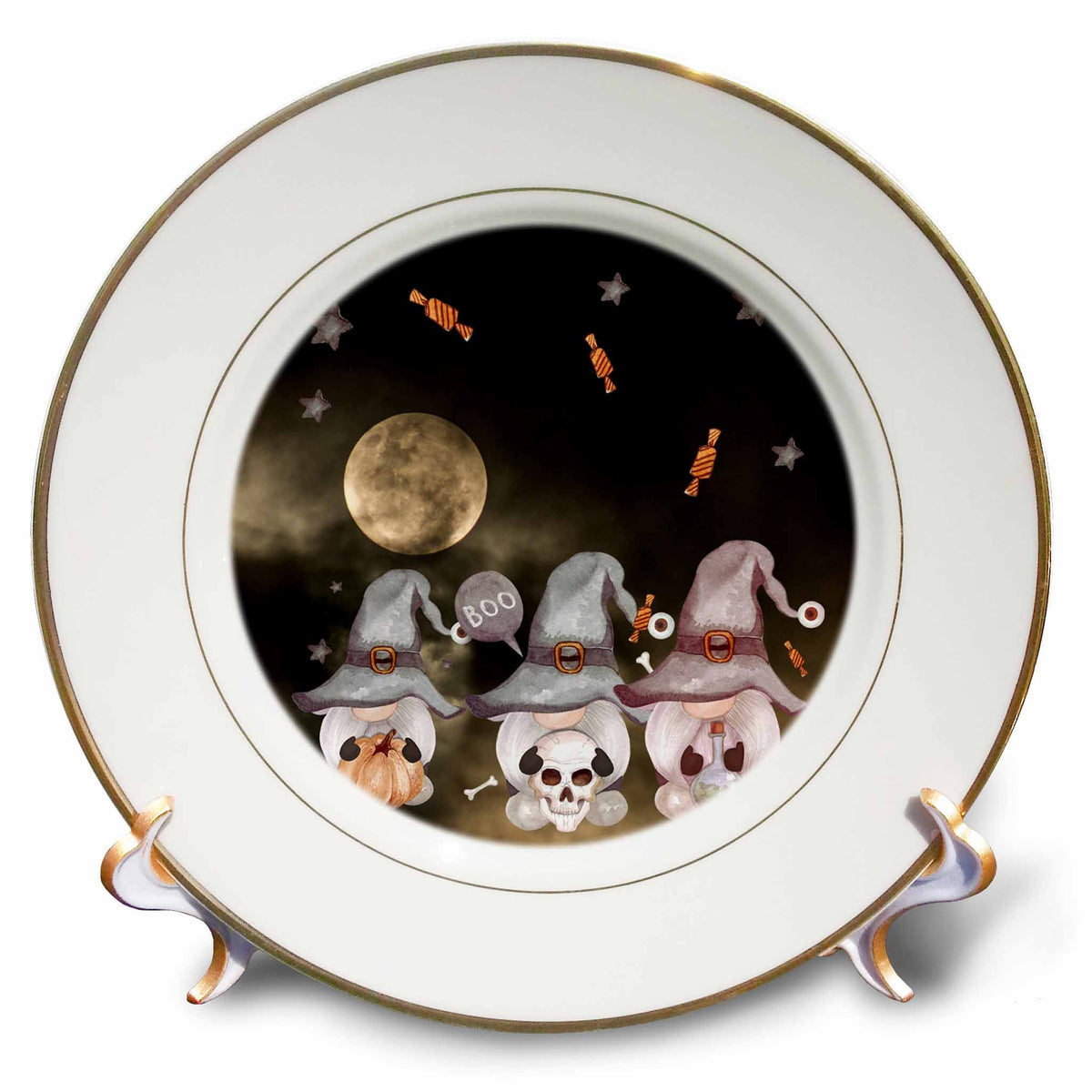 Gold-rimmed decorative plate depicting three witch-hatted gnomes with a pumpkin, skull and potion beneath a full moon.