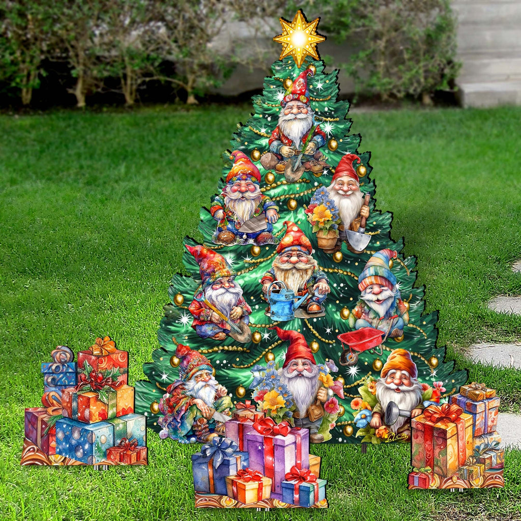 Christmas tree-shaped garden decoration with illustrated gnomes and a gold star, surrounded by gift-shaped stakes.