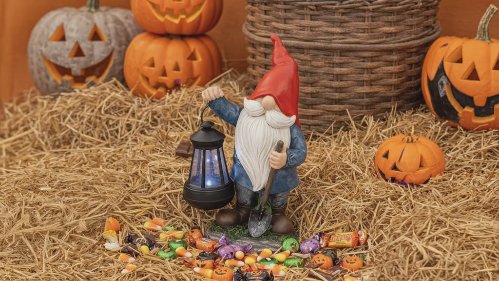 Earnest Garden Gnomes with Lantern - Video spinning around in a fall and Halloween setting 