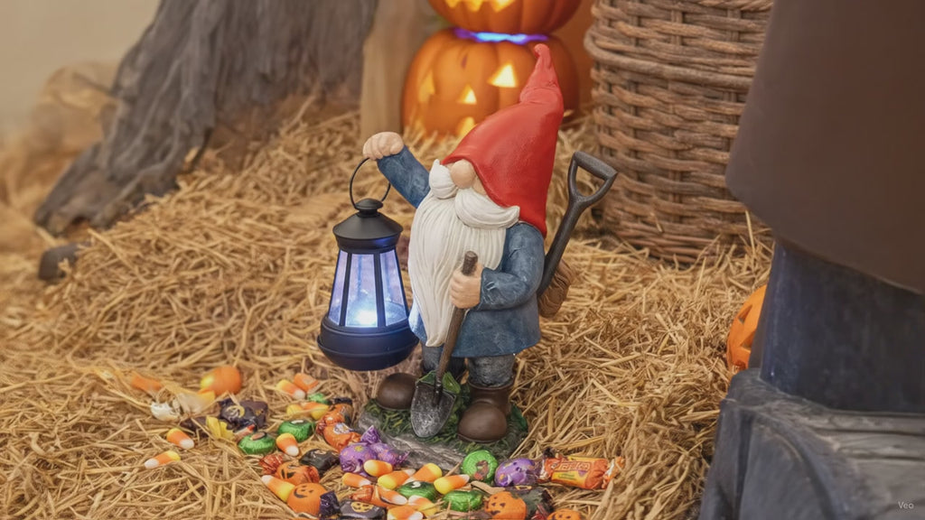 Earnest Garden Gnomes with Lantern - Video spinning around in a fall and Halloween setting 
