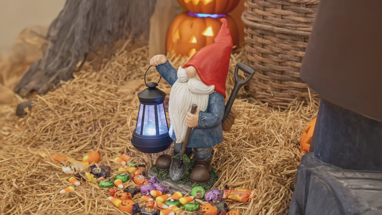 Earnest Garden Gnomes with Lantern - Video spinning around in a fall and Halloween setting 