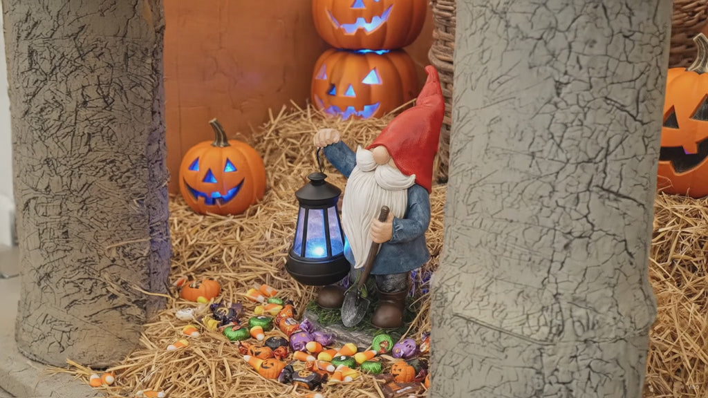 Earnest Garden Gnomes with Lantern - Video spinning around in a fall and Halloween setting 